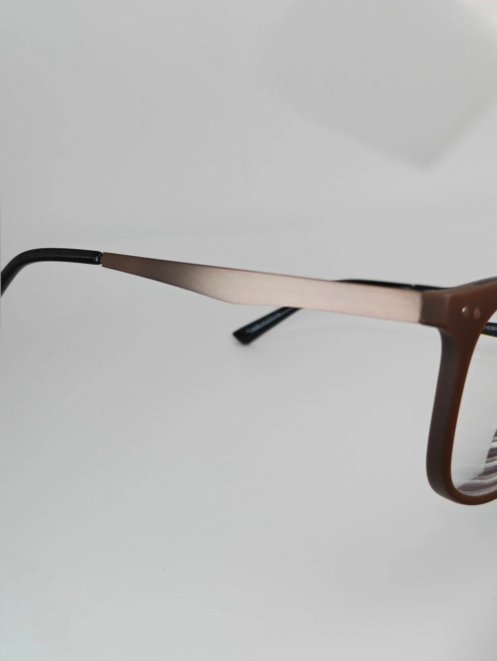 Lyric. Mocha Bronze Round Eyeglass Frames.